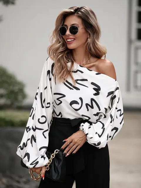 Spring and summer women's fashionable color matching diagonal shoulder long sleeved printed shirt casual women's clothing
