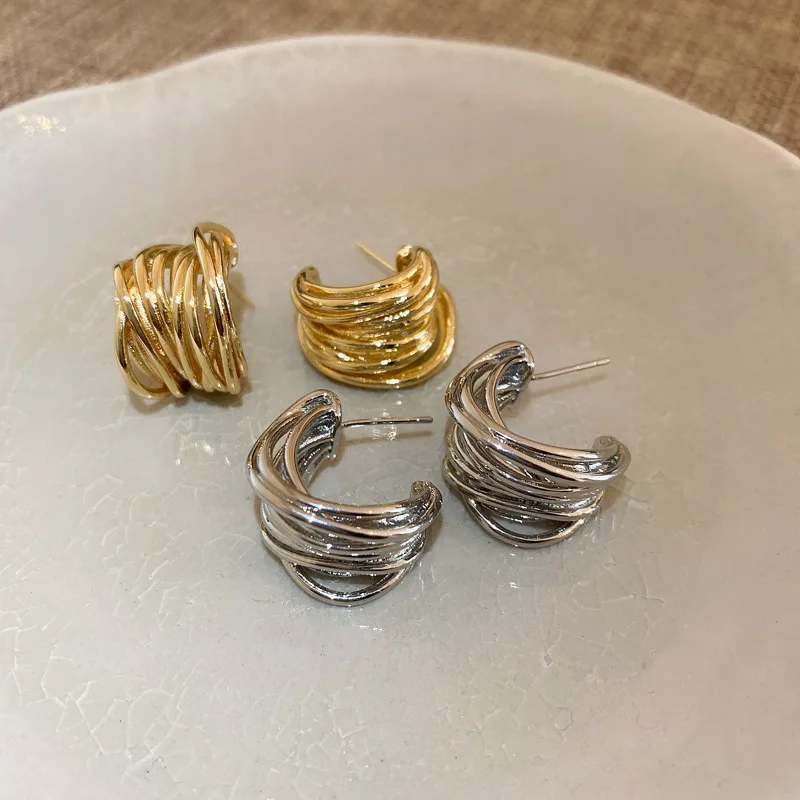 XIALUOKE Punk Metal Hollow Out Winding Geometric Stud Earrings For Women Personality Minimalist Golden Earrings Party Jewelry