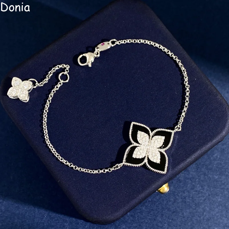 Jewelry  European and American fashion flower titanium steel micro - inlaid AAA zircon shell luxury bracelet