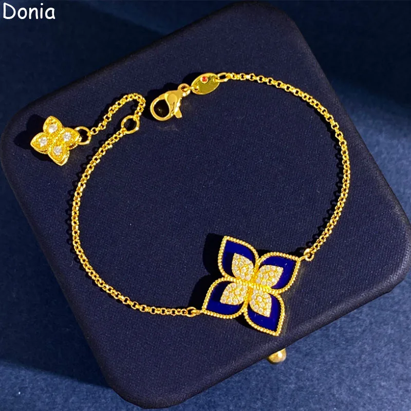 Jewelry  European and American fashion flower titanium steel micro - inlaid AAA zircon shell luxury bracelet
