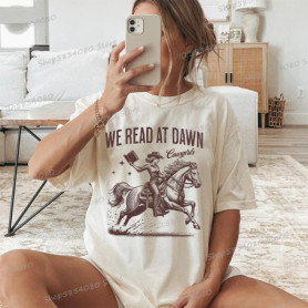 We Read At Dawn Cowgirl T-shirt Vintage Country Bookish Tops Gift for Book Lover Tee Bookish Cowgirl Retro Funny Reading Tshirt